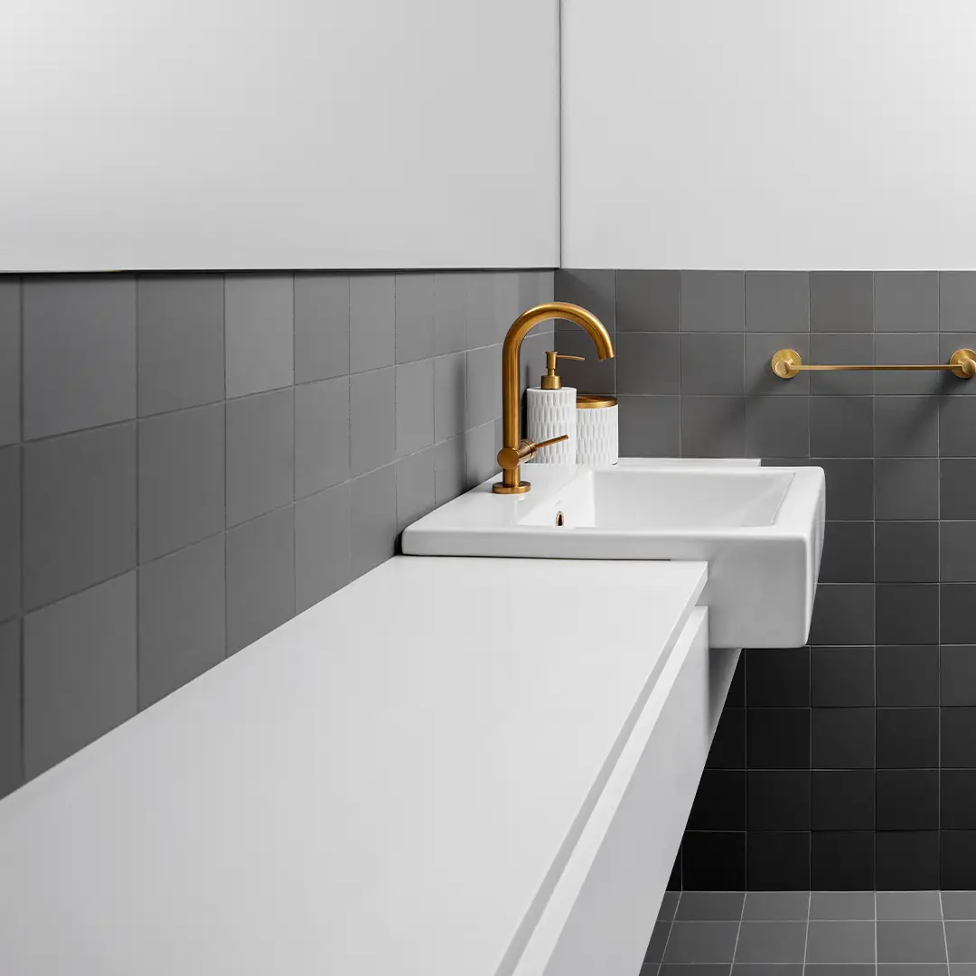 custom bathroom with golden taps
